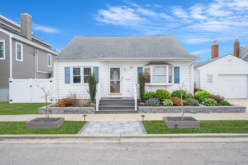 Welcome to this beautifully renovated 4-bedroom, 2-bath - Beach Home for sale in Lindenhurst, New York on Beachhouse.com