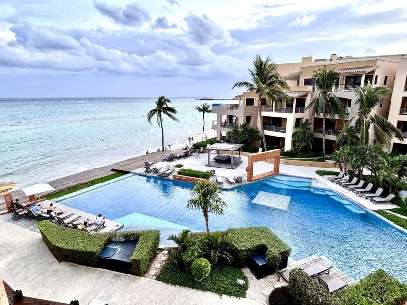 Superb beachfront apartment in Playa del Carmen, offering - Beach Condo for sale in Playa Del Carmen,  on Beachhouse.com