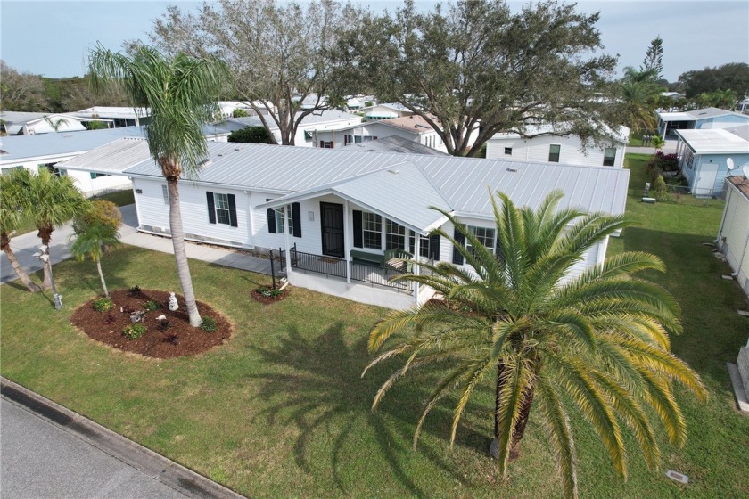 Spacious 3-bedroom home spans two building lots. Newer Metal - Beach Home for sale in Barefoot Bay, Florida on Beachhouse.com