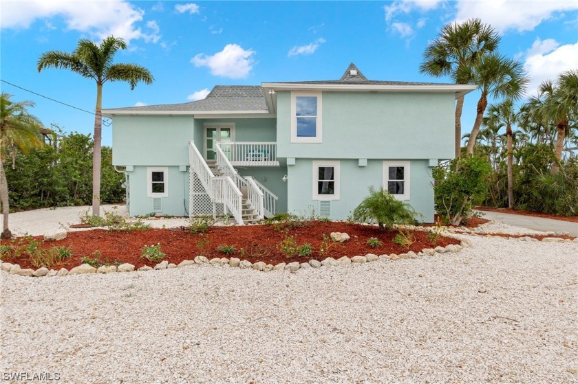 JUST REDUCED! Located in the desirable beach neighborhood, Lake - Beach Home for sale in Sanibel, Florida on Beachhouse.com