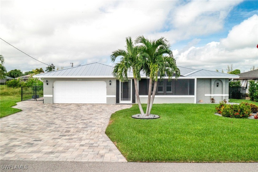 This stunning 3-bedroom, 2-bath Gulf access home in SE Cape - Beach Home for sale in Cape Coral, Florida on Beachhouse.com