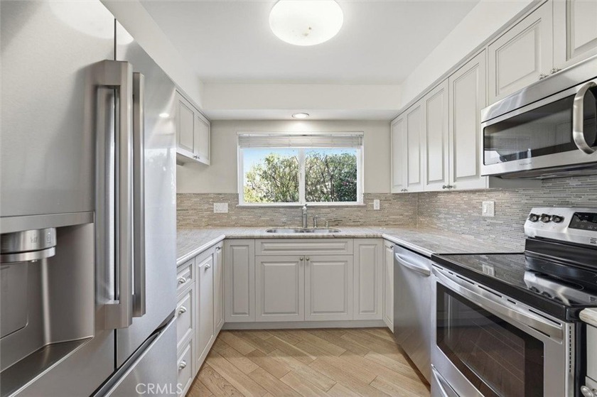 Welcome to this light-filled 2-bedroom, 2-bath Bungalow - Beach Condo for sale in Torrance, California on Beachhouse.com