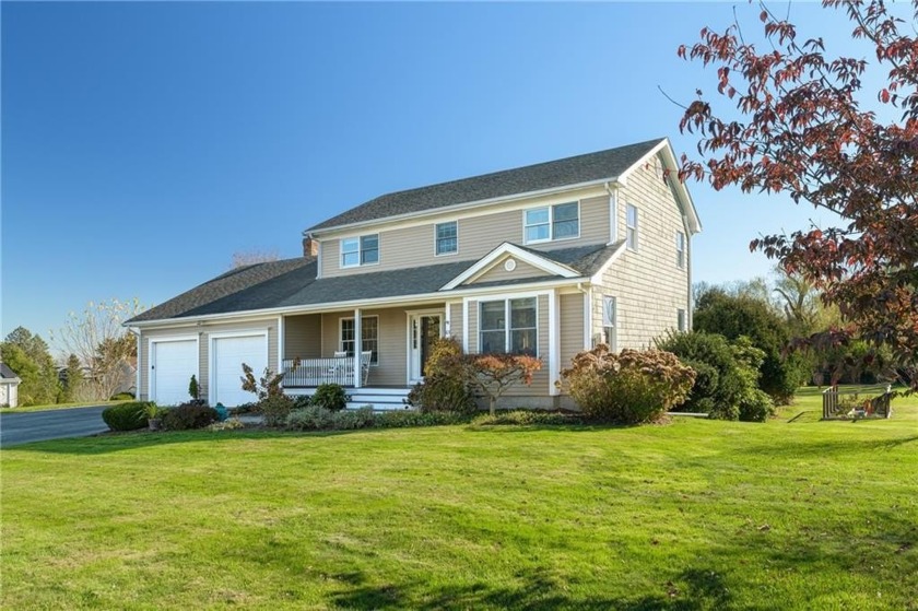 Beautifully sited on .66 acres of lush lawn, this - Beach Home for sale in Portsmouth, Rhode Island on Beachhouse.com