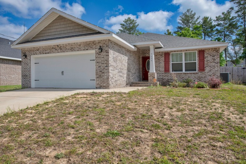 This beautiful home in Holley is a must see! Stepping through - Beach Home for sale in Navarre, Florida on Beachhouse.com