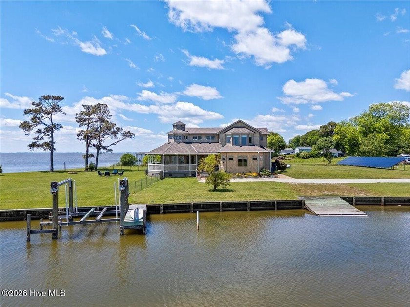 Set along Knotts Island's shoreline, this waterfront retreat - Beach Home for sale in Knotts Island, North Carolina on Beachhouse.com