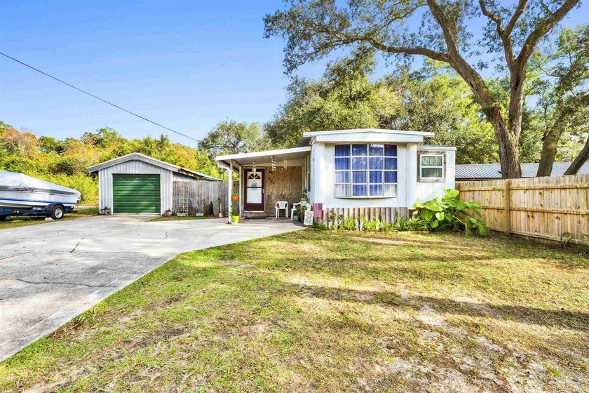Adorably cozy, well maintained mobile home with many great - Beach Home for sale in Pensacola, Florida on Beachhouse.com