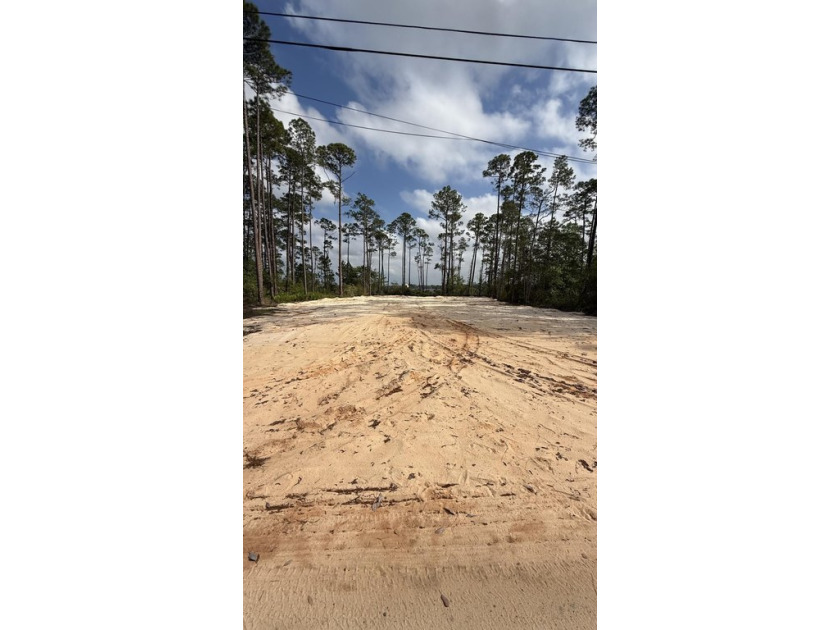 This stunning Bay front property is waiting for you to build the - Beach Lot for sale in Navarre, Florida on Beachhouse.com