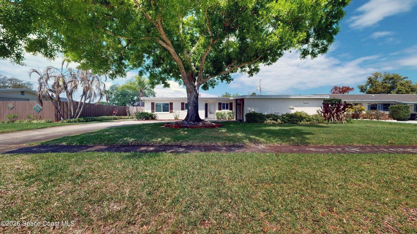 Welcome to your coastal retreat in the highly sought-after - Beach Home for sale in Merritt Island, Florida on Beachhouse.com