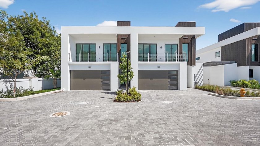 MOVE IN READY! Introducing H2O Dania, a newly delivered, gated - Beach Townhome/Townhouse for sale in Dania, Florida on Beachhouse.com