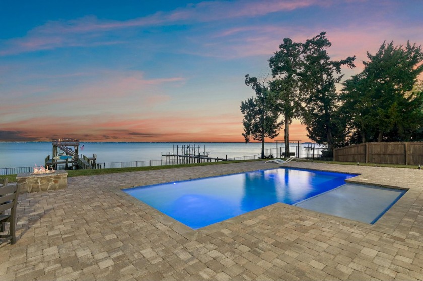 Absolutely Stunning Bayfront Estate featuring immaculate 2022 - Beach Home for sale in Freeport, Florida on Beachhouse.com