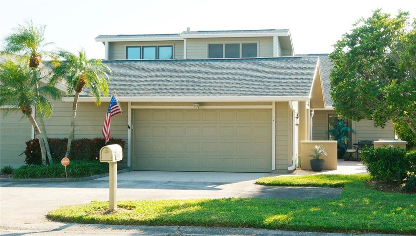Discover this exceptional 3-bedroom, 2-bathroom villa with an - Beach Home for sale in Bradenton, Florida on Beachhouse.com