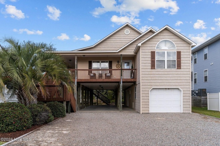 Sought after Davis Canal Front Property featuring pier, floating - Beach Home for sale in Oak Island, North Carolina on Beachhouse.com