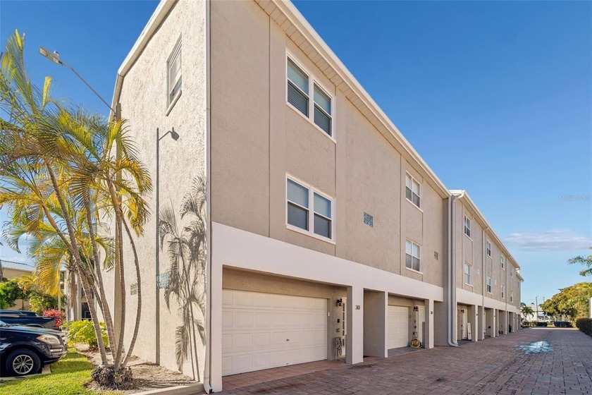 FULLY DEEDED BOAT SLIP WITH LIFT TOGETHER WITH UPDATED CORNER - Beach Townhome/Townhouse for sale in St. Petersburg, Florida on Beachhouse.com