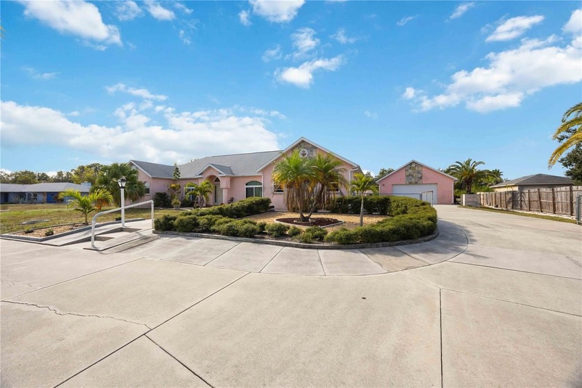 Welcome to this spacious three-bedroom, three-bath residence - Beach Home for sale in Venice, Florida on Beachhouse.com