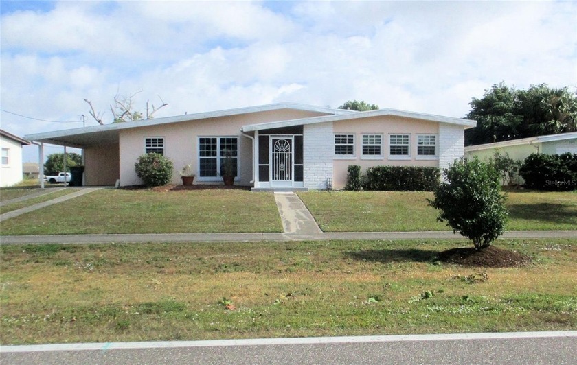 Well-maintained home with view of spring fed freshwater canal - Beach Home for sale in Port Charlotte, Florida on Beachhouse.com
