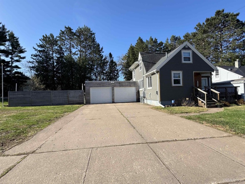 This inviting home offers space and charm with modern comforts - Beach Home for sale in Ironwood, Michigan on Beachhouse.com