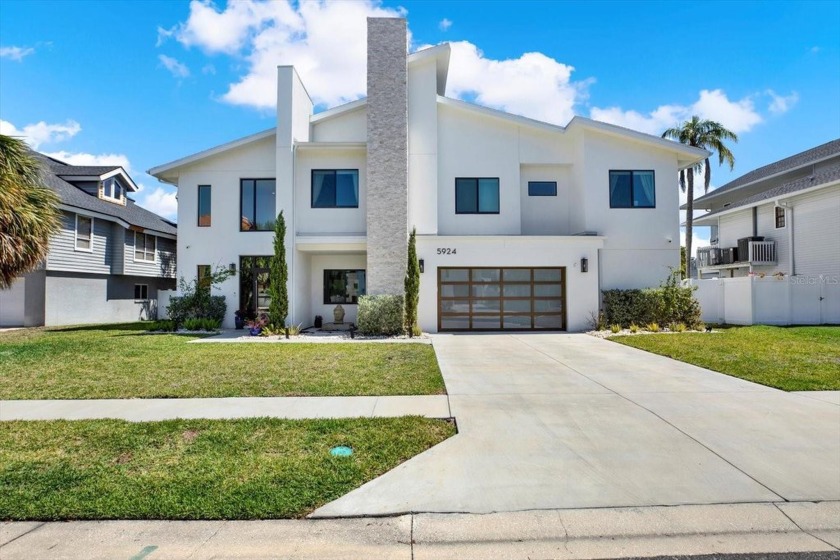 WELCOME TO THIS STUNNING CUSTOM-BUILT MASTERPIECE LOCATED IN THE - Beach Home for sale in Gulfport, Florida on Beachhouse.com
