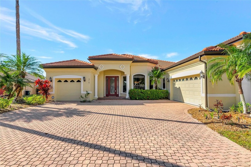 Set on one of the larger homesites in Country Meadows, this - Beach Home for sale in Bradenton, Florida on Beachhouse.com