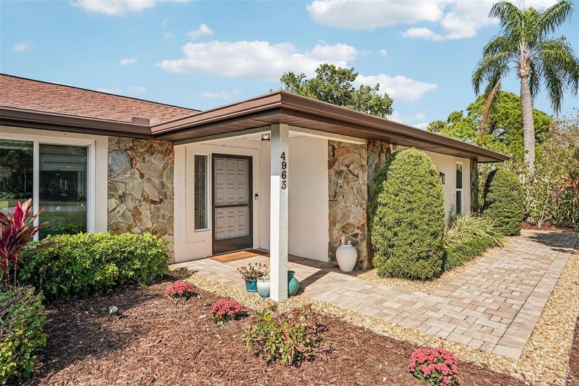 Tasteful three bedroom, two bath residence with heated private - Beach Home for sale in Sarasota, Florida on Beachhouse.com