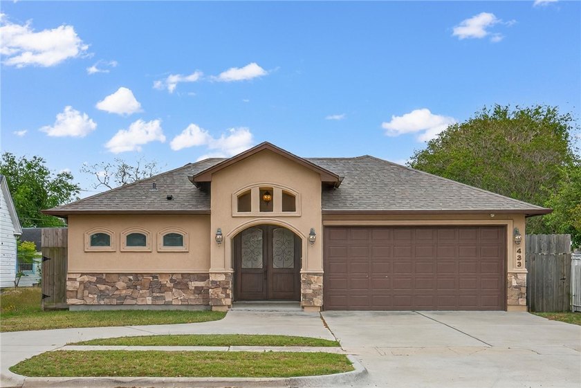 Mediterranean style stucco home with stone accents built in 2017 - Beach Home for sale in Corpus Christi, Texas on Beachhouse.com