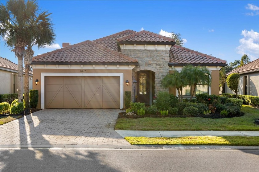 Enjoy Resort-Style Living with this beautifully upgraded Piceno - Beach Home for sale in Lakewood Ranch, Florida on Beachhouse.com