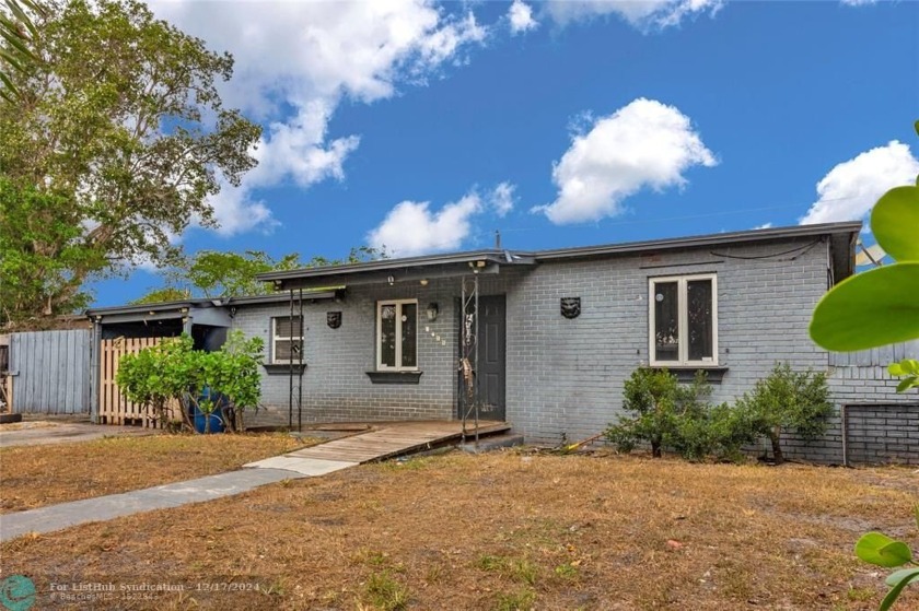 This cozy home on a large lot is full of potential and ready for - Beach Home for sale in Pompano Beach, Florida on Beachhouse.com