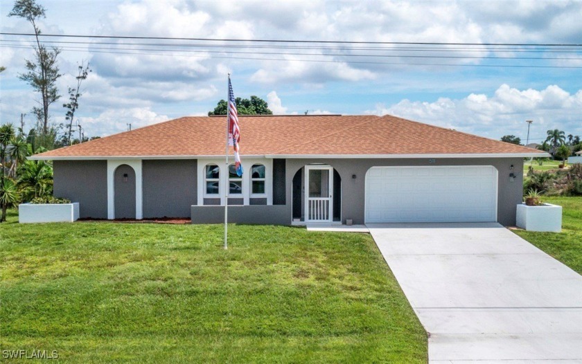 Welcome to this Charming 3-Bedroom, 2-bath canal home! The brand - Beach Home for sale in Cape Coral, Florida on Beachhouse.com