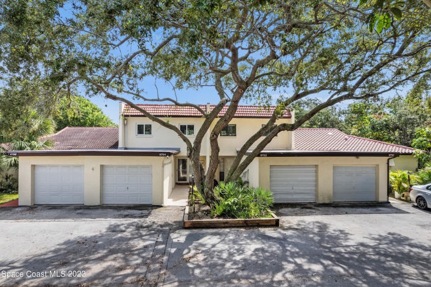 Nestled in coveted gated Ocean Woods community, this fully - Beach Townhome/Townhouse for sale in Cape Canaveral, Florida on Beachhouse.com