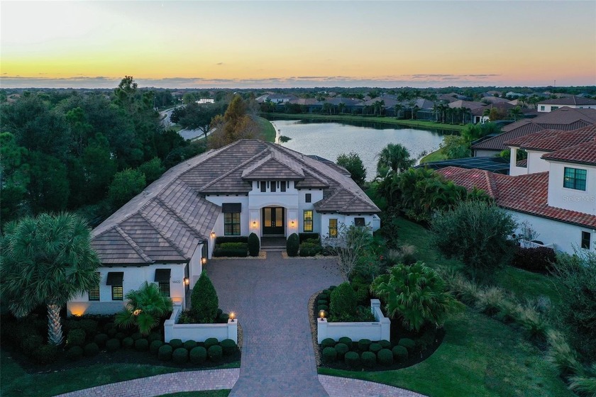 Stunning Arthur Rutenberg Custom Home with Long Lake Views in - Beach Home for sale in Lakewood Ranch, Florida on Beachhouse.com