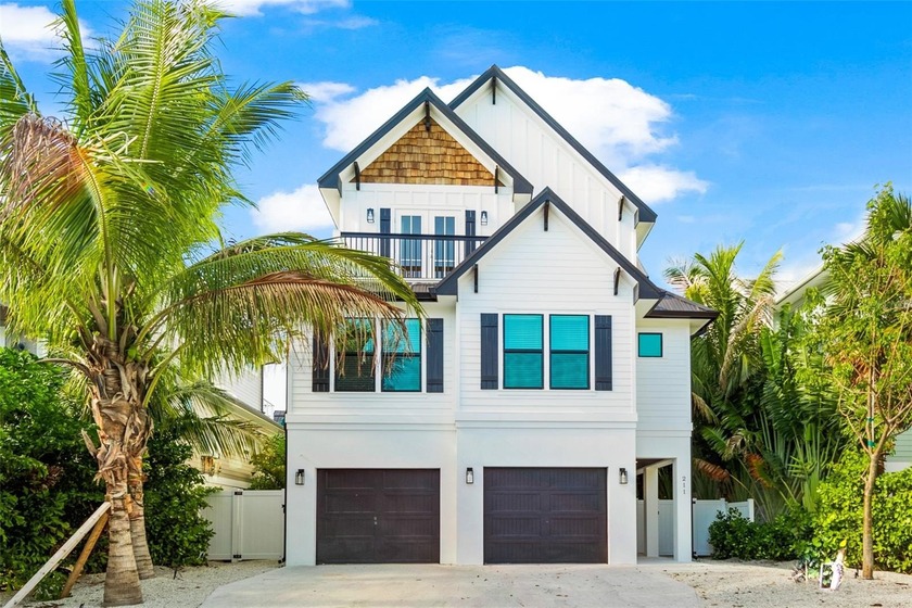 This exceptional newer-built coastal retreat on Lido Key - Beach Home for sale in Sarasota, Florida on Beachhouse.com