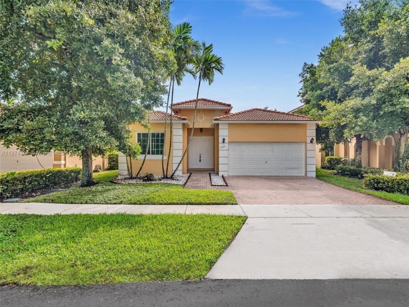 Lakefront 4BD/3BA pool home in the sought-after gated community - Beach Home for sale in Miramar, Florida on Beachhouse.com