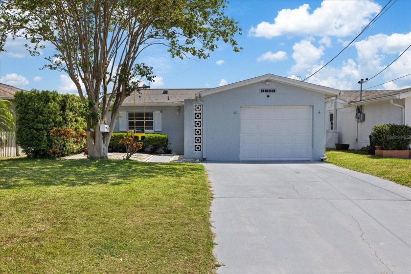 Welcome to 5106 Blue Heron Drive, a beautifully renovated - Beach Home for sale in New Port Richey, Florida on Beachhouse.com