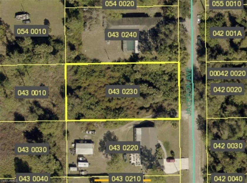 This half-acre lot is tucked away on a quiet dead-end - Beach Lot for sale in Lehigh Acres, Florida on Beachhouse.com