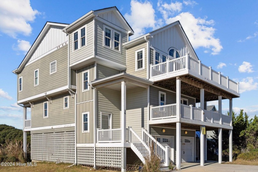 This stunning two-story, site-built home offers the perfect - Beach Home for sale in North Topsail Beach, North Carolina on Beachhouse.com