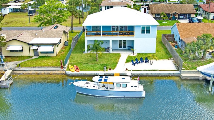This elevated waterfront gem on a desirable lot in Hernando - Beach Home for sale in Hernando Beach, Florida on Beachhouse.com