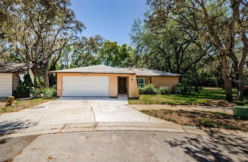 Welcome to 10641 Timber Lane, a beautifully maintained residence - Beach Home for sale in Port Richey, Florida on Beachhouse.com
