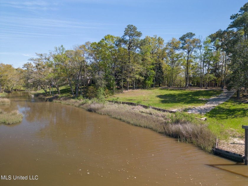 Welcome to this beautiful half-acre waterfront lot in Gulf Park - Beach Lot for sale in Ocean Springs, Mississippi on Beachhouse.com