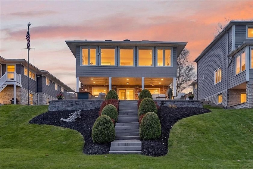 Set along the coveted shoreline of Lake Ontario on .72 acres - Beach Home for sale in Rochester, New York on Beachhouse.com
