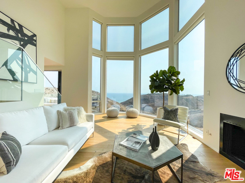 Experience unobstructed panoramic ocean and canyon views at this - Beach Home for sale in Malibu, California on Beachhouse.com