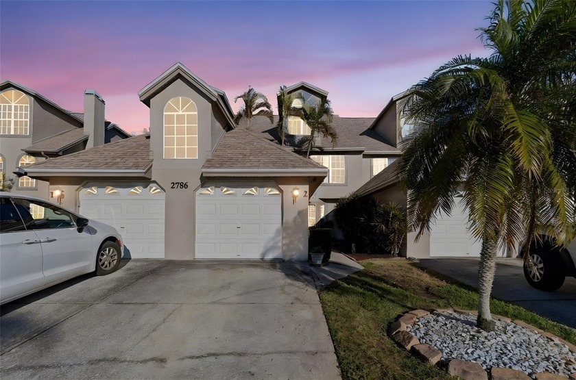 Discover this stunning three-story townhome featuring 5 bedrooms - Beach Townhome/Townhouse for sale in Clearwater, Florida on Beachhouse.com
