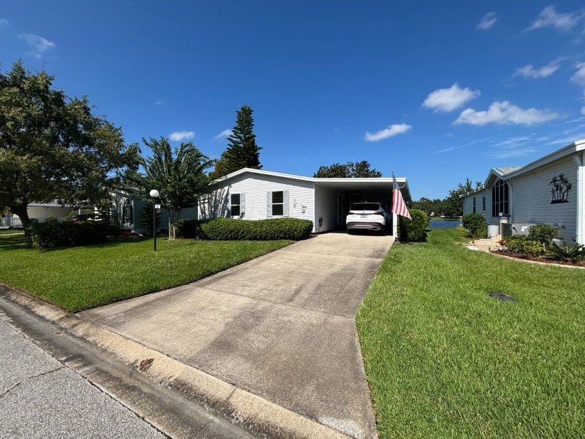 This beautiful 2 bedroom, 2 bath lake front home has a great - Beach Home for sale in Ormond Beach, Florida on Beachhouse.com