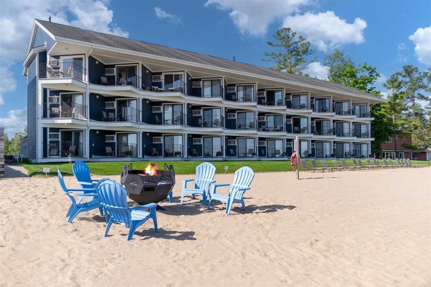 *2023 RENTAL HISTORY: $30,056* On the sandy shores of Lake - Beach Home for sale in Traverse City, Michigan on Beachhouse.com