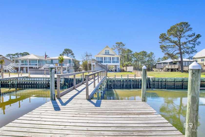 Waterfront paradise with pool and boat dock down Fort Morgan! - Beach Home for sale in Gulf Shores, Alabama on Beachhouse.com
