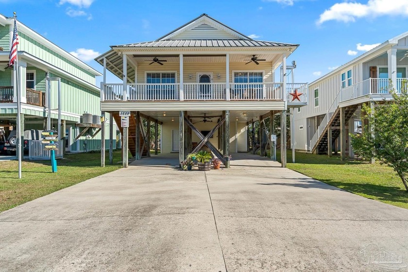 Discover your coastal escape in the coastal community of Bear - Beach Home for sale in Orange Beach, Alabama on Beachhouse.com