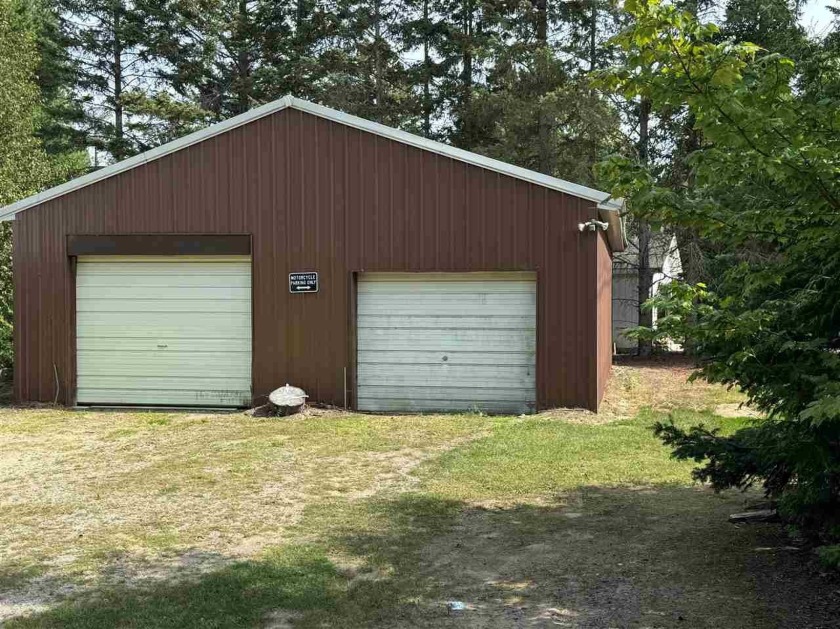 Priced to sell.  Sitting on the bluff with the view of Lake - Beach Home for sale in Cheboygan, Michigan on Beachhouse.com