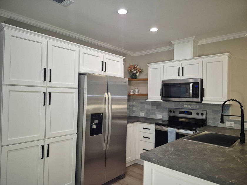 G-18  Brand New Palm Harbor Home features;  -White cabinetry - Beach Home for sale in Merritt Island, Florida on Beachhouse.com
