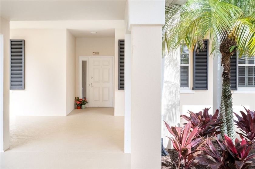 Enjoy ground floor convenience and a beautiful water view with - Beach Home for sale in Vero Beach, Florida on Beachhouse.com