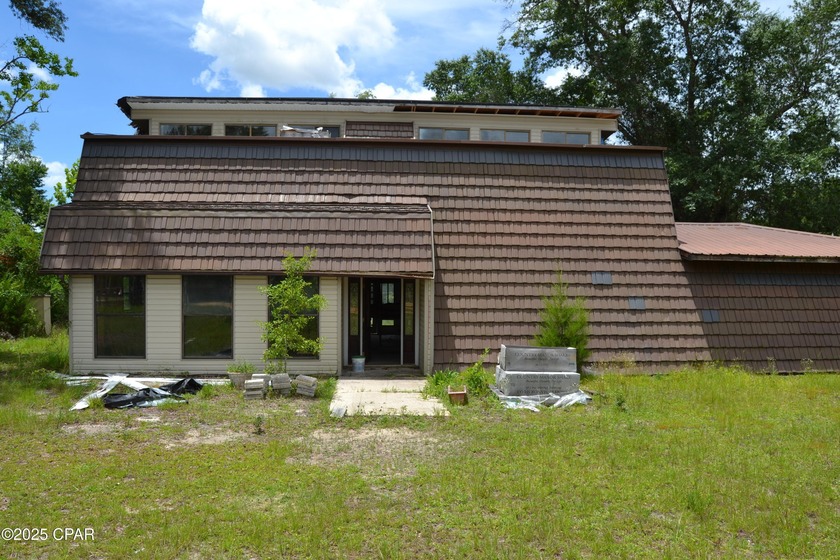 Investors look here!!! This 4 bedroom 2 bath home i located on - Beach Home for sale in Panama City, Florida on Beachhouse.com