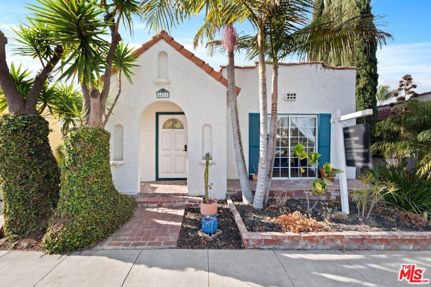 Welcome home to this stunning 1925 Spanish Bungalow, located in - Beach Home for sale in Long Beach, California on Beachhouse.com