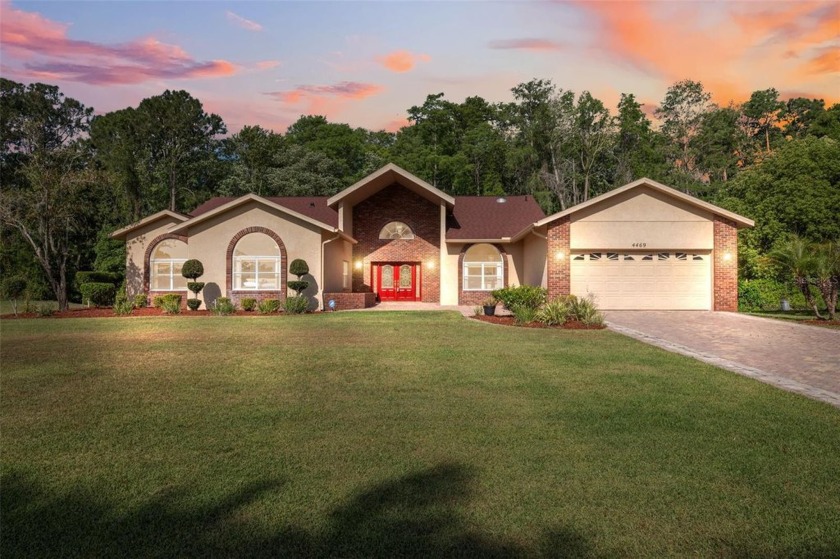 Step into timeless elegance in this expansive over-3,300 sq ft - Beach Home for sale in Spring Hill, Florida on Beachhouse.com